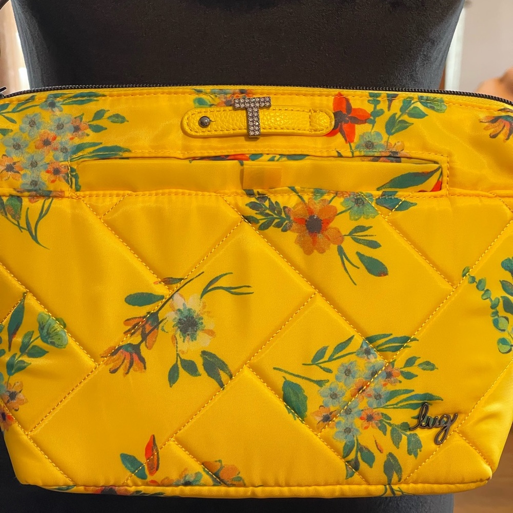 Yellow multi-colored floral LUG Flare 2 crossbody bag.